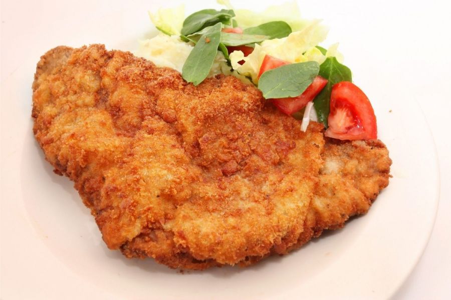 Home cooked breaded chicken breast or chicken schnizel.