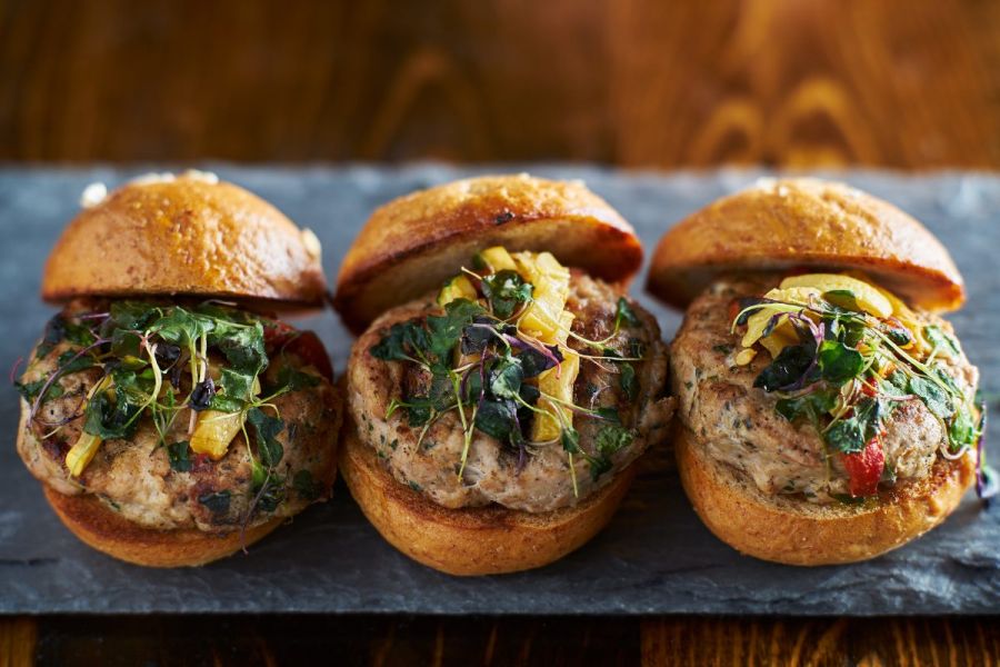Three burgers with turkey and feta patties.